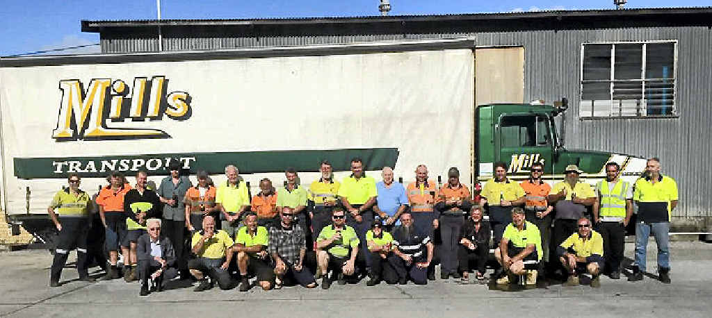 ALL TOGETHER: Staff from Mills Transport at Murwillumbah on their last day. ALL TOGETHER: Staff from Mills Transport at Murwillumbah on their last day.